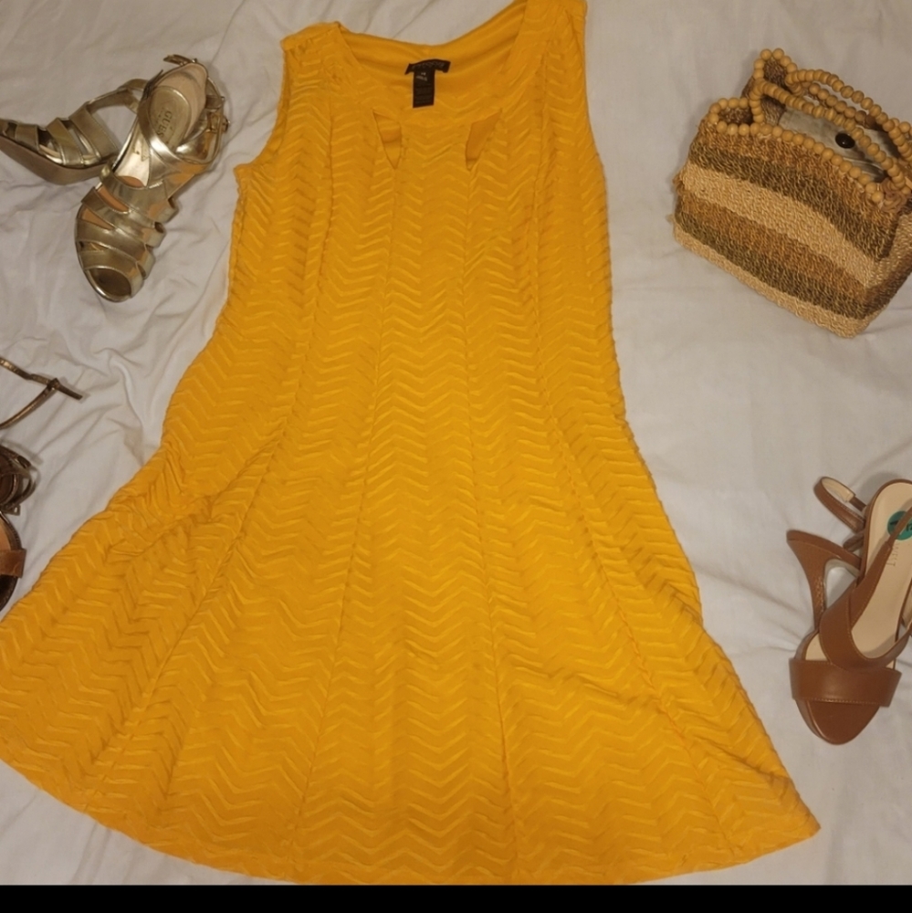 Enfocus Studio yellow dress. Zigzag textured accents. Chest cutouts Fit to flare